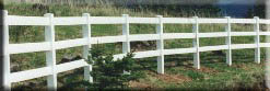 Vinyl 3 Rail around a arched corner installed by valley fence