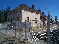 Double Drive Commercial gate, Old jail in the town of Rathdrum Idaho, after many years of keeping bad people in, it was finally fenced to keep bad people out