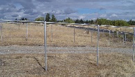 2 layers of 47 inch field fence with top rail, approximate height 6 ft.